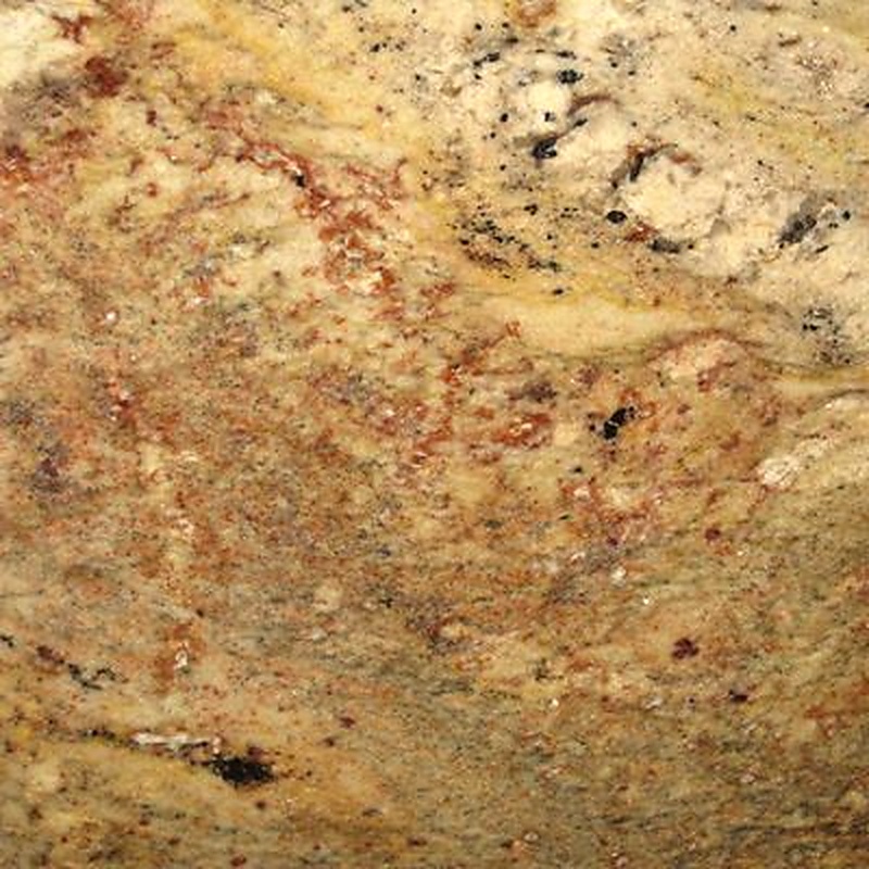 Close-up of golden granite slab with natural veining and mineral patterns.